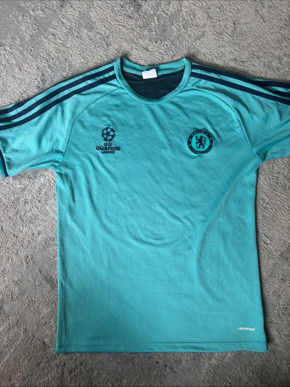 Chelsea Teal Training Tee with Champions Logo